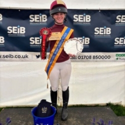 Riding to Glory: Junior Championship Title Earned