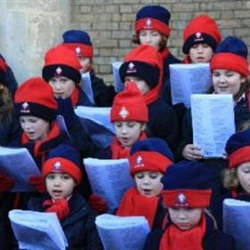 Godolphin Prep Choir Sing at Salisbury Christmas Market - Photo 1