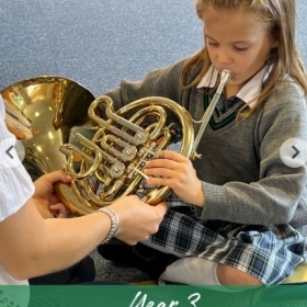 Year 3 trying their hand at brass - Photo 1