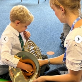 Year 3 trying their hand at brass - Photo 2