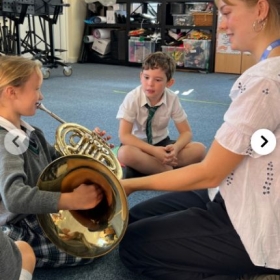 Year 3 trying their hand at brass - Photo 3