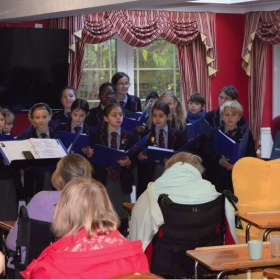 School Choir Perform At AMI Court Care Home - Photo 2